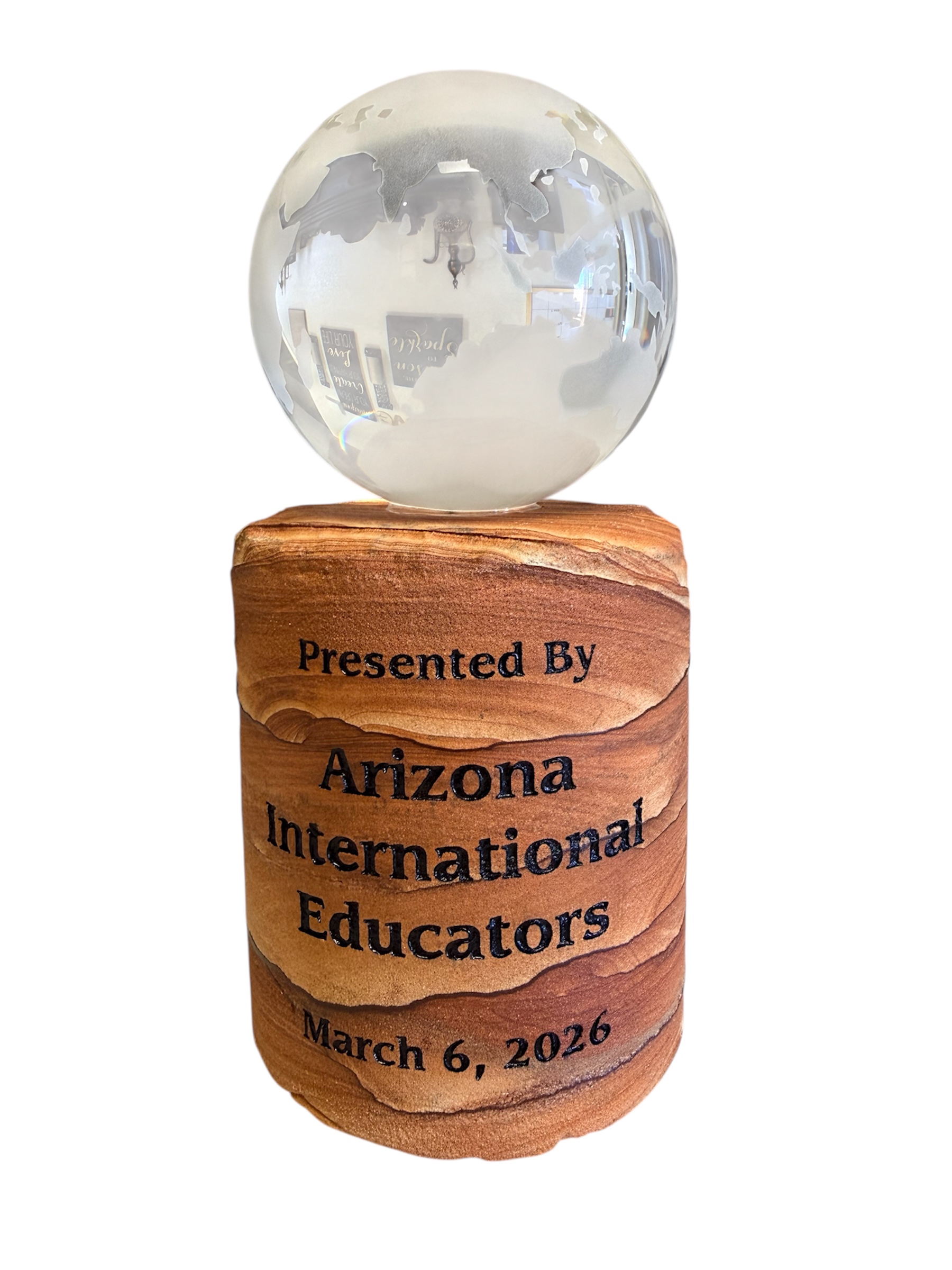 Frosted crystal globe mounted on engraved Arizona Picture Rock base