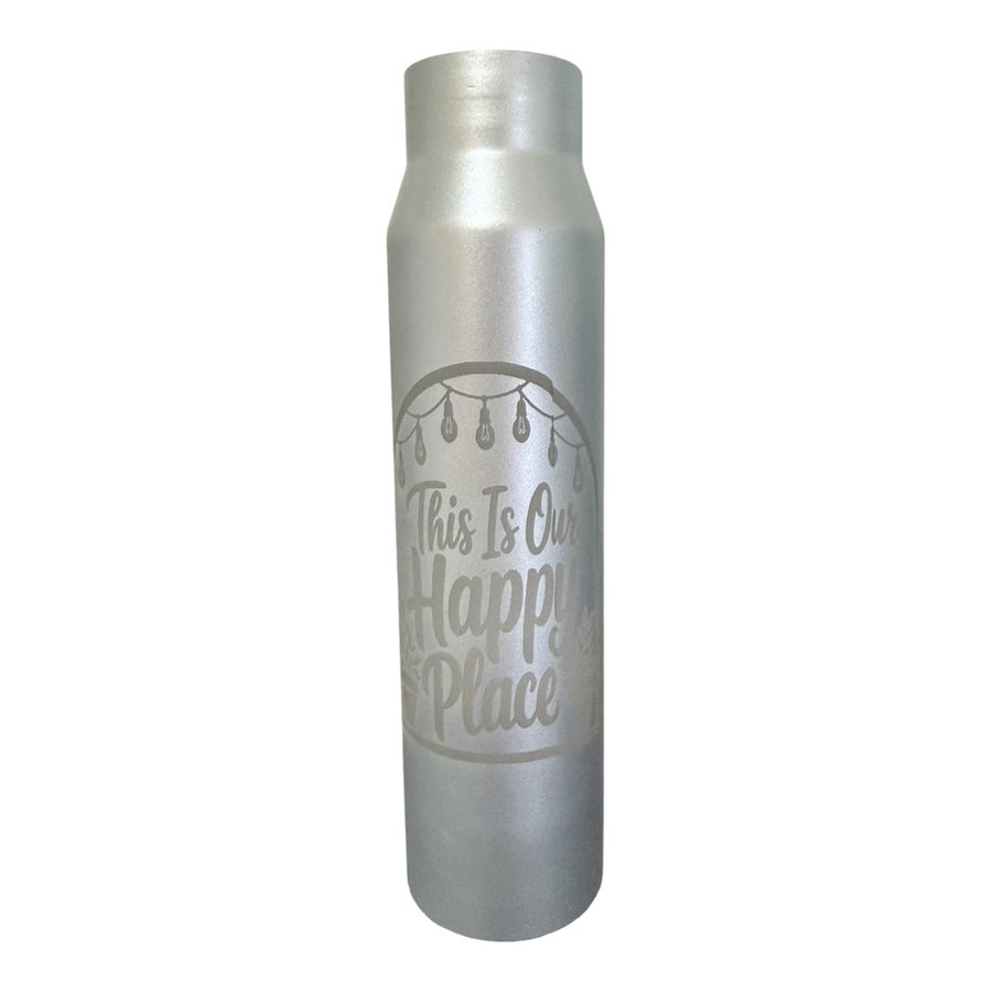 Silver A-10 30mm shell engraved with This Is Our Happy Place lettering