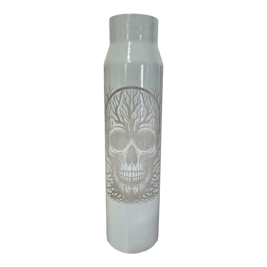 Light A-10 30mm shell engraved with a skull and tree design