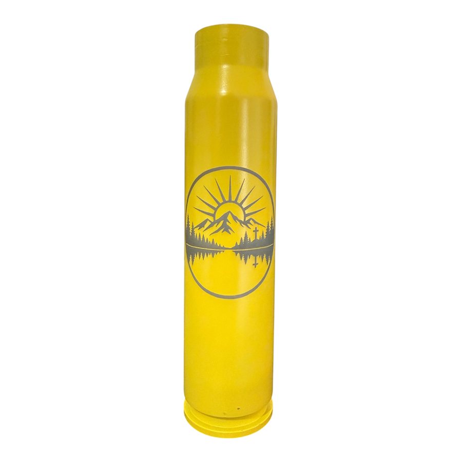 Yellow A-10 30mm shell engraved with a mountain sunrise and lake design