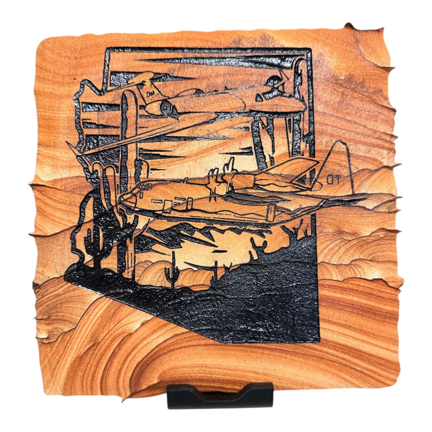 Arizona sandstone piece engraved with aviation artwork, desert scenery, and multiple aircraft