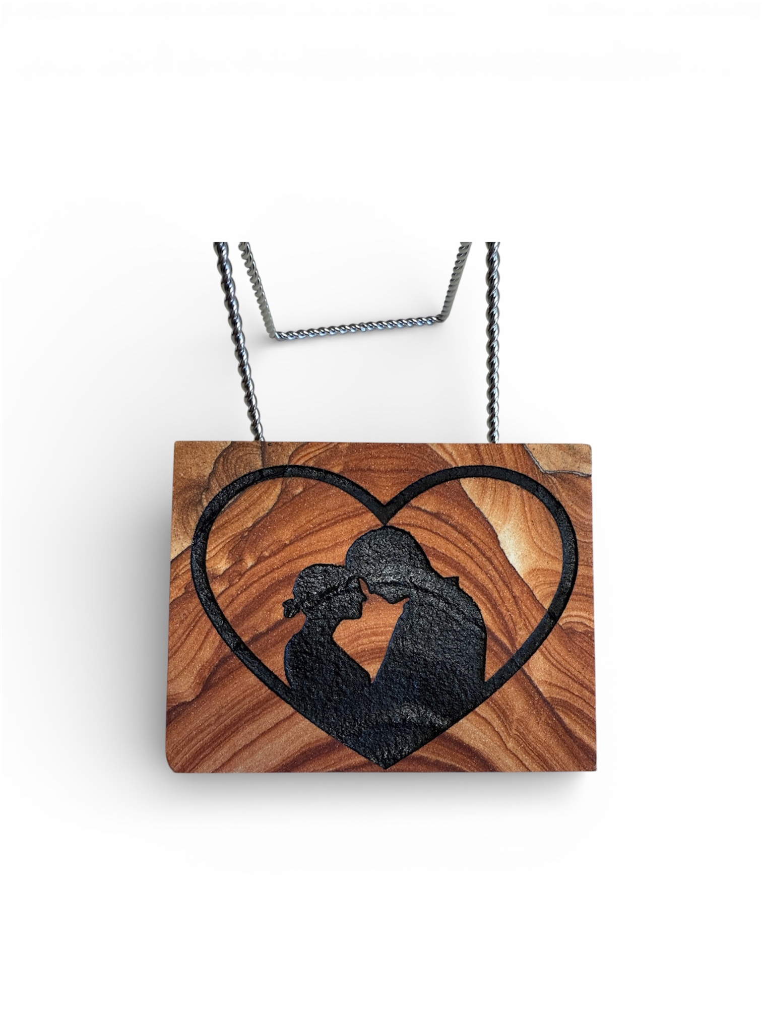 Arizona sandstone family keepsake with parent and child silhouette inside a heart